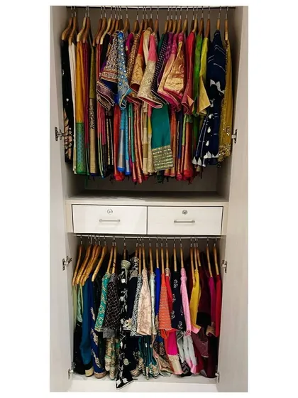 I have a special love for organizing Indian wear. This wardrobe shows how I hang sarees and suits to protect the fabric and make choosing your outfit for the day a joyful experience.