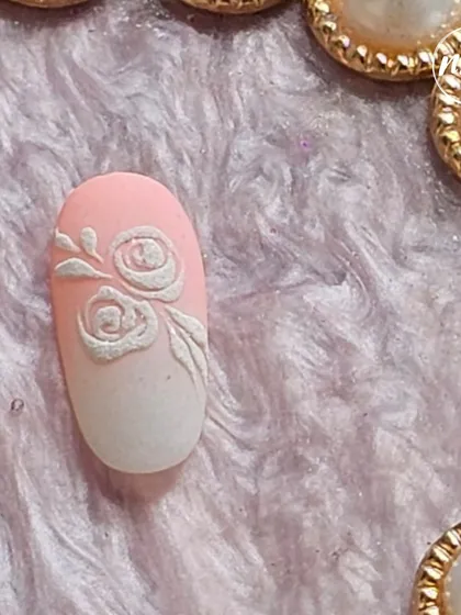 A simple yet beautiful embossed rose design on an ombre base, created by a student mastering 3D techniques.
