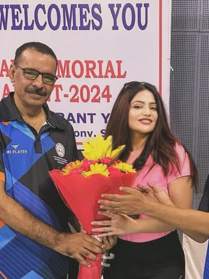 Receiving a token of appreciation at the SCBA Badminton Tournament. Maintaining a work-life balance and engaging with my colleagues outside the courtroom is important for mental and physical fitness.