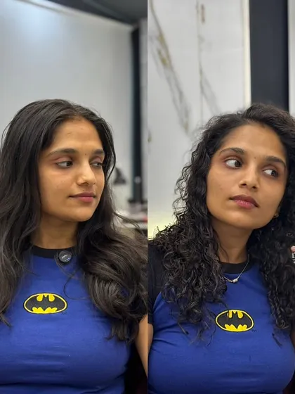 This is the modern perm. I took her straight hair and gave it these beautiful, natural-looking curls. It's all about adding texture and volume without the frizz of old-school perms.