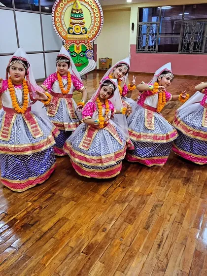 Our young dancers in traditional costumes, ready for a performance. We teach them the importance of presentation and respecting the traditional attire of the dance form.