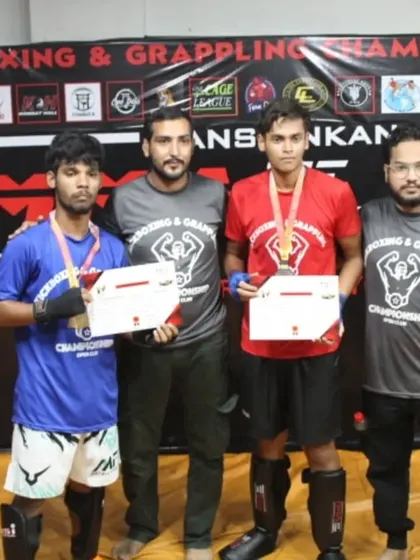 Our coaches with two more successful fighters from the MFC Series 2.