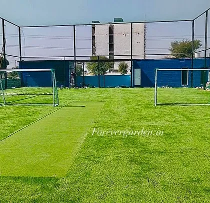 A ground-level view of a multi-sport ground I completed, featuring goals for football and a central cricket pitch. This showcases the versatility of my installations for schools and community centers.