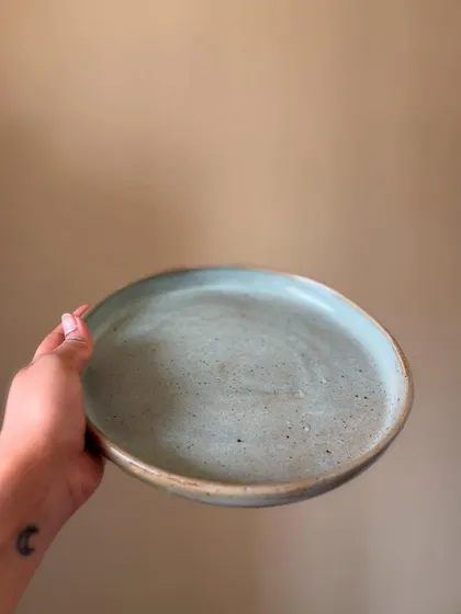 This is our dinner plate in the Chun glaze, a beautiful pale blue with earthy speckles. It’s a versatile piece that makes any meal feel a little more special.