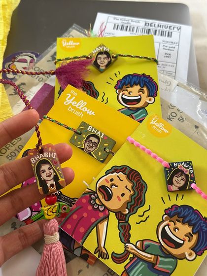 A handful of our custom portrait Rakhis, ready to be shipped out for Raksha Bandhan.