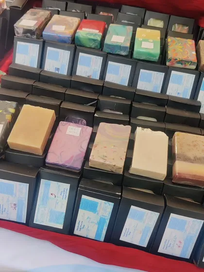 A close-up of my cold process soap display. I have them in boxes, ready to go, with a few samples out so you can see and smell them.