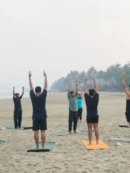 Starting our session with Urdhva Hastasana, reaching for the sky. This simple posture helps to lengthen the spine and set a positive, energetic tone for the practice ahead.