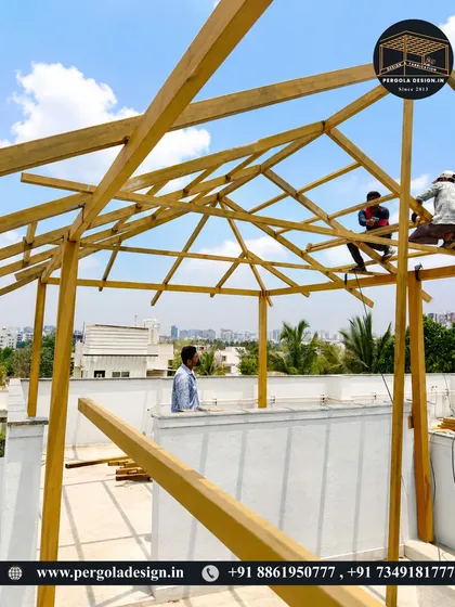 Another shot of the rooftop construction, showing the complexity of the A-frame roof structure.