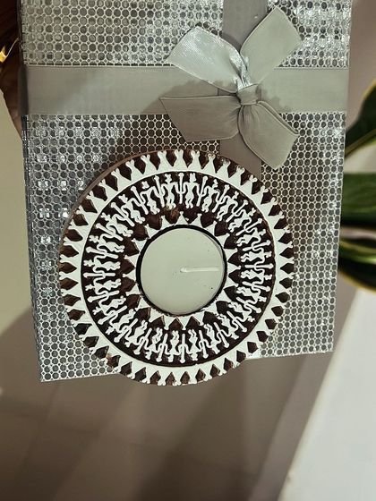 This elegant Diwali gift hamper features a box of my assorted stuffed dates alongside a beautifully crafted diya. It's a simple yet thoughtful way to share health and light during the festival.