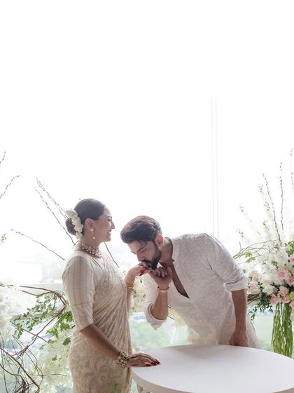 A tender moment from Sonakshi and Zaheer's registration ceremony. We designed a minimal and elegant backdrop of white florals to create a serene and intimate atmosphere for this deeply personal part of their wedding.