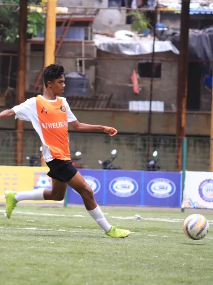 A player strikes the ball towards goal during our match against Indian Football Academy.