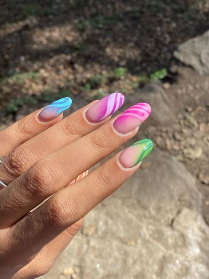 A beautiful rainbow gradient design with abstract white lines, captured in natural light.