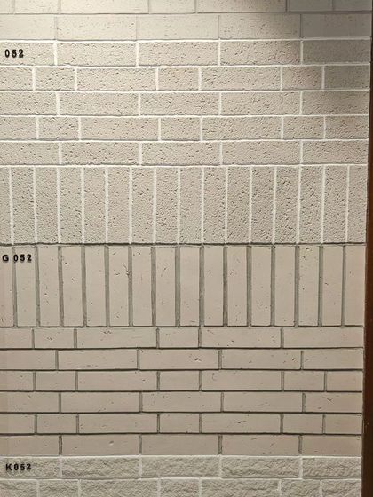 A display of Ittimi panels that replicate various brick-laying patterns. This is a lightweight, easy-to-install alternative to traditional brick walls.