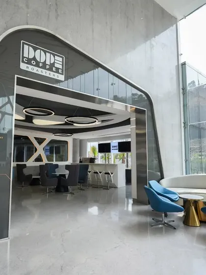 This is an establishing shot for a commercial project with Architect Reza Kabul, capturing the striking entrance of Dope Coffee Roasters. My goal here was to create a powerful first impression, highlighting the modern, futuristic archway and giving a glimpse of the sleek interior waiting inside.