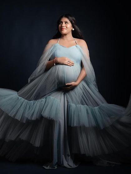 See the incredible movement and flow of our tiered Winter gown. A simple twirl creates a dramatic, windswept effect that looks stunning in photos.