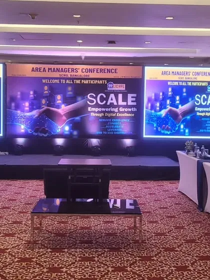 This is our setup for an Area Managers' Conference, featuring a U-shaped seating arrangement for better interaction. We provided a three-panel LED video wall for a wide, immersive presentation experience.