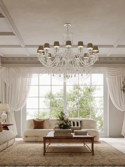 This family lounge is an inviting yet elegant space designed for comfort. A coffered ceiling and large windows provide an architectural framework for a mix of modern and classic furniture, striking a perfect balance for family gatherings.