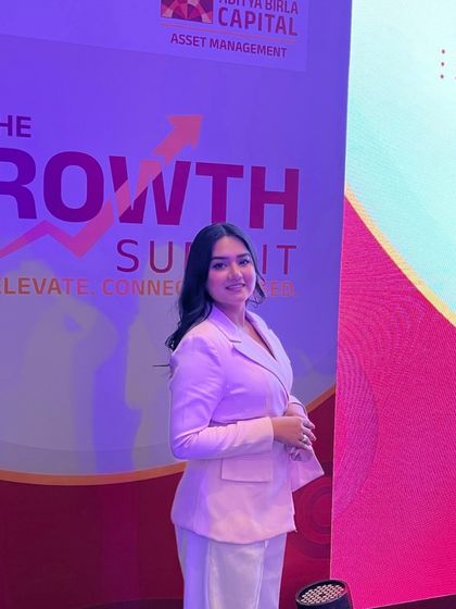 A picture-perfect moment at the Aditya Birla Sun Life AMC Growth Summit. I ensure I am always ready for the camera, reflecting the professionalism of the event itself.
