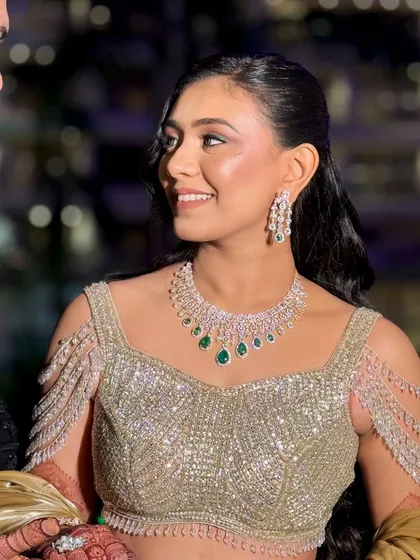 A glamorous Sangeet look requires makeup that shines under the lights. Here, I created a soft smokey eye and a glowing base that looks stunning from every angle, perfect for a night of celebration.