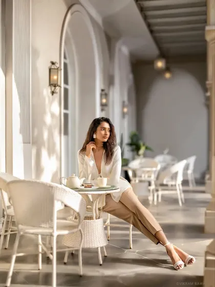Serenity in style. A lifestyle shot for Raheja Universal, creating an atmosphere of calm, luxurious living for their real estate advertising campaign.