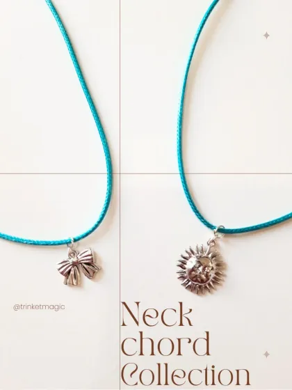 A simple and chic pairing of the bow and sun charm necklaces on a teal cord. This shows how you can layer them or wear them solo.