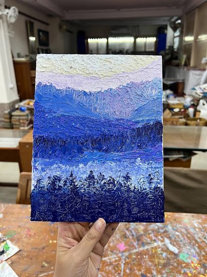 This beautiful monochromatic landscape in shades of blue shows how impasto techniques can create a sense of depth and atmosphere, even with a limited color palette.
