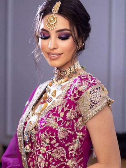 The same purple smokey eye look, with eyes closed to showcase the beautiful blending.