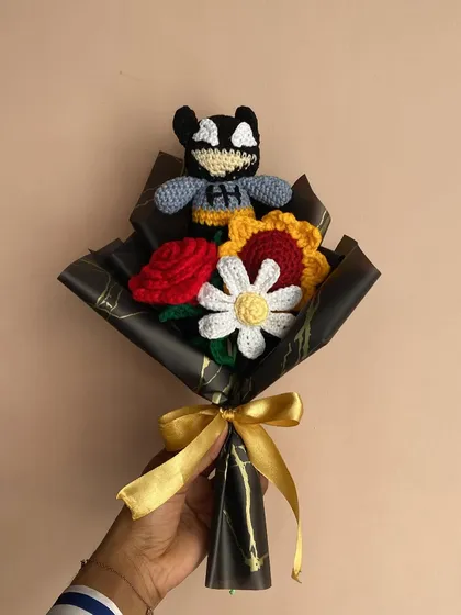 Another angle of the Batman-themed bouquet. You can customize the types of flowers and colors to go with any character you choose.
