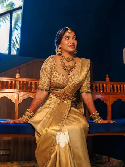 A bride deserves to shine. For Aparna, I crafted this full gold raw silk blouse, a luminous statement of bridal opulence. Intricate zardosi, sparkling katdana, and delicate pearls come together to create a piece that is designed to dazzle.