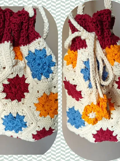A closer look at the crochet potli bag, showing the drawstring closure and the beautiful texture of the granny squares.