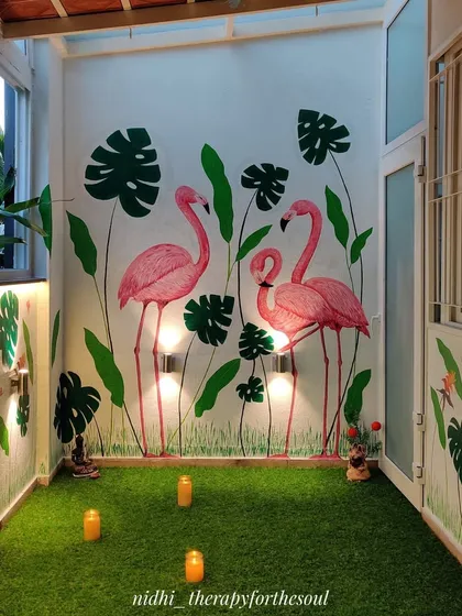 This balcony became a vibrant tropical escape with a hand-painted flamingo mural. It’s a perfect example of how we can bring the outdoors in, creating a fun and inviting space for family gatherings or a quiet evening.
