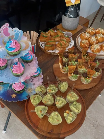 A grazing table I put together for a baby shower, featuring a mix of my sweet and savoury bites like cupcakes, mini quiches, and salads.