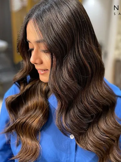 A final shot of this balayage masterpiece, showing off the beautiful dimension and movement in the hair.