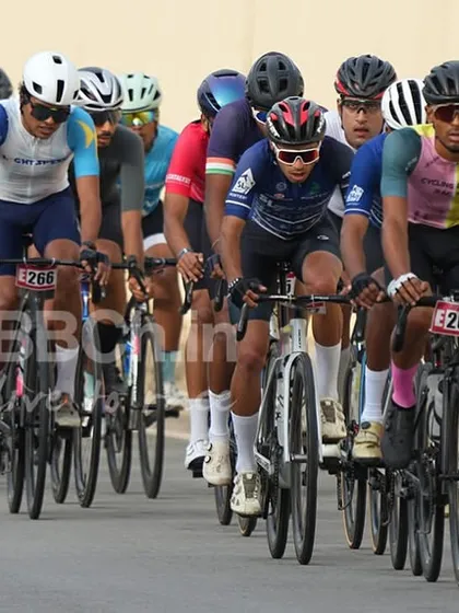 This is what premier road racing looks like. A massive peloton of dedicated cyclists battles for position during the Bangalore Classic Road Race, showcasing the scale and intensity of our events.