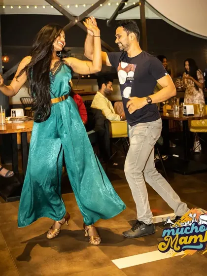 Here I am, sharing a dance and a smile on the floor. These socials are my passion, a place for everyone to connect, have fun, and shine, no matter their skill level.