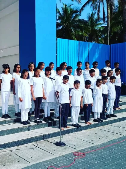 Another angle of our student choir performing outdoors. Public performances like this are a core part of our mission to develop confident young artists.