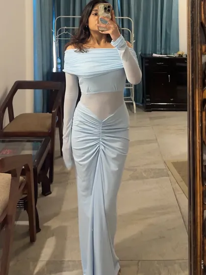 This is what I call a "Pinterest-coded" dress. It's that one standout piece that does all the talking. I help you find these unique, flattering gowns that are perfect for parties, cocktails, or when you just want to feel incredible.