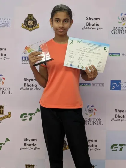 Anishka Kartik proudly displays her bronze medal trophy for the Girls' Singles U15 category.