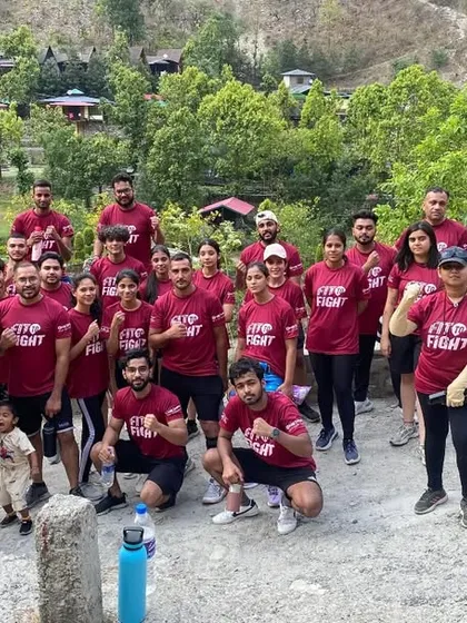 The full squad posing together during our MMA camp in Uttarakhand. We believe that training together in new environments builds a stronger, more resilient team.