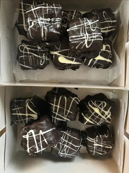 Boxes of rich Double Chocolate Brownies, ready for delivery.