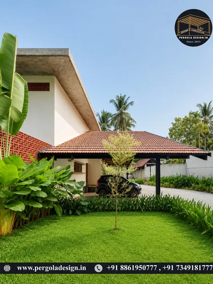 We designed this simple yet elegant carport to blend seamlessly with the home's minimalist design. The dark steel frame supports a traditional tiled roof, providing a functional parking space that feels like a natural extension of the house.
