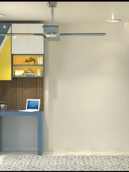 A vibrant and energetic kids' room with a blue and yellow color scheme. The design includes a study desk with overhead storage and a geometric-patterned wardrobe.