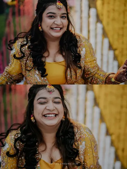The pure, uncontainable joy of a Haldi ceremony. This candid shot captures the bride's infectious laughter, a moment of genuine happiness surrounded by the vibrant colors and traditions of the celebration.