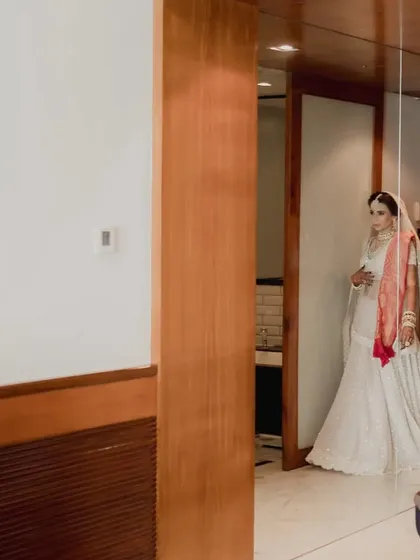 The bride's grand entrance for the first look reveal. We coordinate with photographers to capture these moments from the perfect angle.