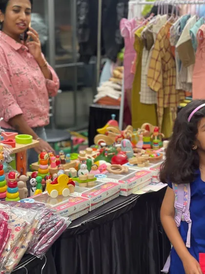It's a joy to see children's eyes light up when they discover our toy stalls. I curate vendors who offer unique, often handcrafted, items like these beautiful wooden toys that encourage imaginative play away from screens.