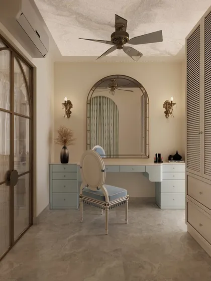 Another view of the sophisticated vanity, showcasing the fluted wardrobe doors and the elegant arched mirror that serves as the centerpiece.