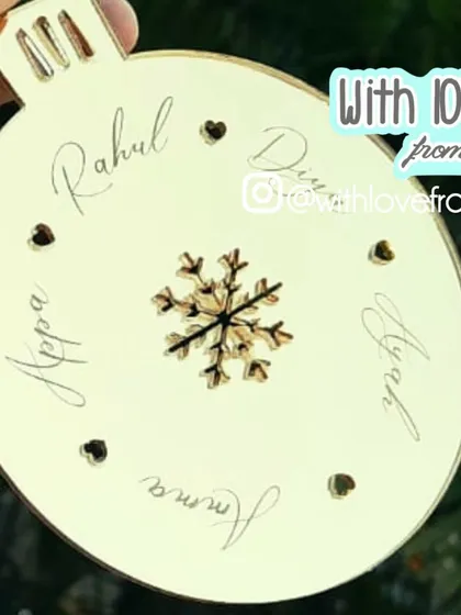 Keep your family close with this personalized Christmas bauble. I can engrave the names of all your loved ones around a central snowflake design, creating a beautiful family tree ornament you'll cherish for years.