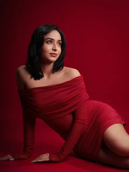 Another look from the red series, this time with a soft, upward gaze. It adds a touch of vulnerability and grace to a portfolio.