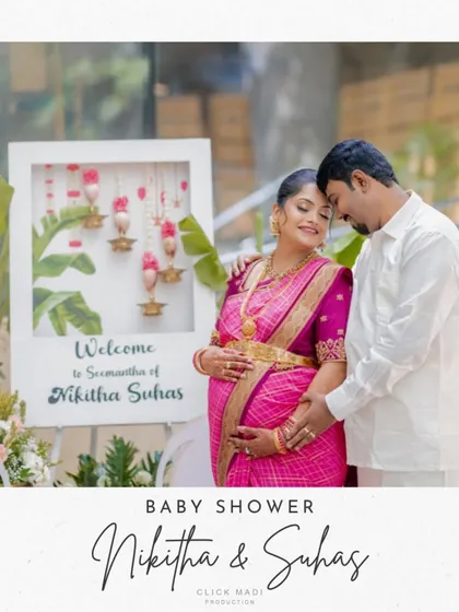 A classic portrait from a beautiful baby shower in Bangalore. The couple's gentle embrace and happy smiles, set against the elegant decor, perfectly capture the essence of this special day celebrating their growing family.