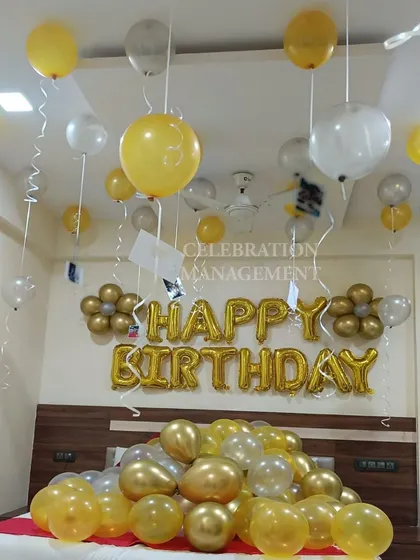 Hanging photos from the balloon ribbons is a wonderful way to personalize the decoration and remind the person of all your happy memories together.